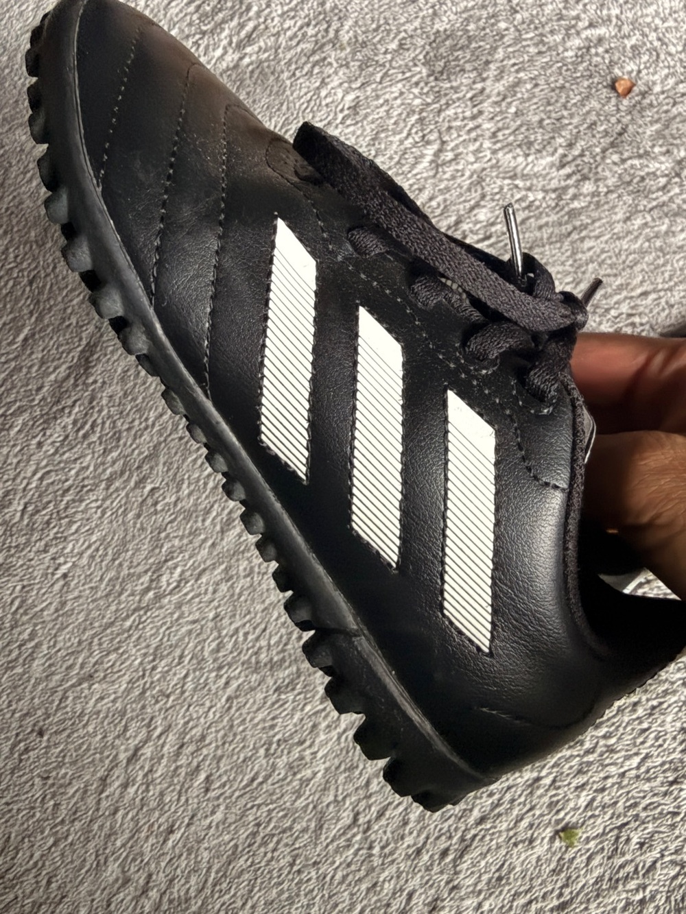 Adidas kids Black Athletic Turf Shoes with White Stripes